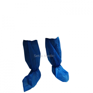 A pair of blue color boot cover with elastic at ankle and knee placed upright and front facing